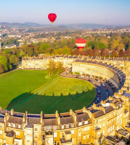 Bath Cresent from a drone view with two hot air balloons in the sky